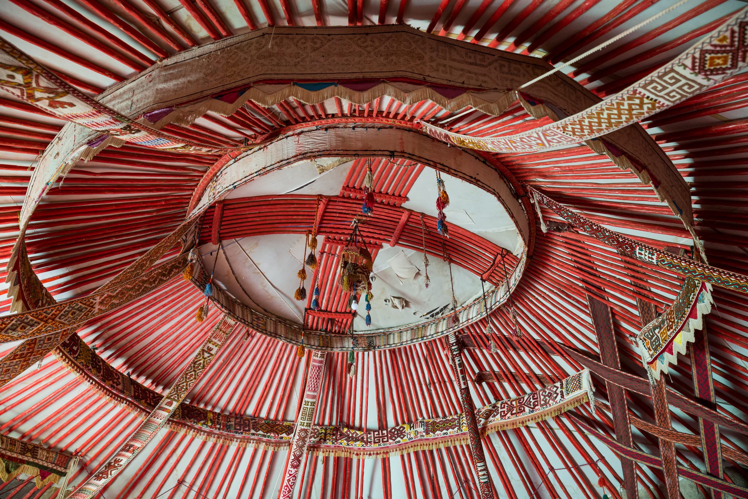 Interior decoration of the yurt. Wooden circular frame covered with fabric and felt